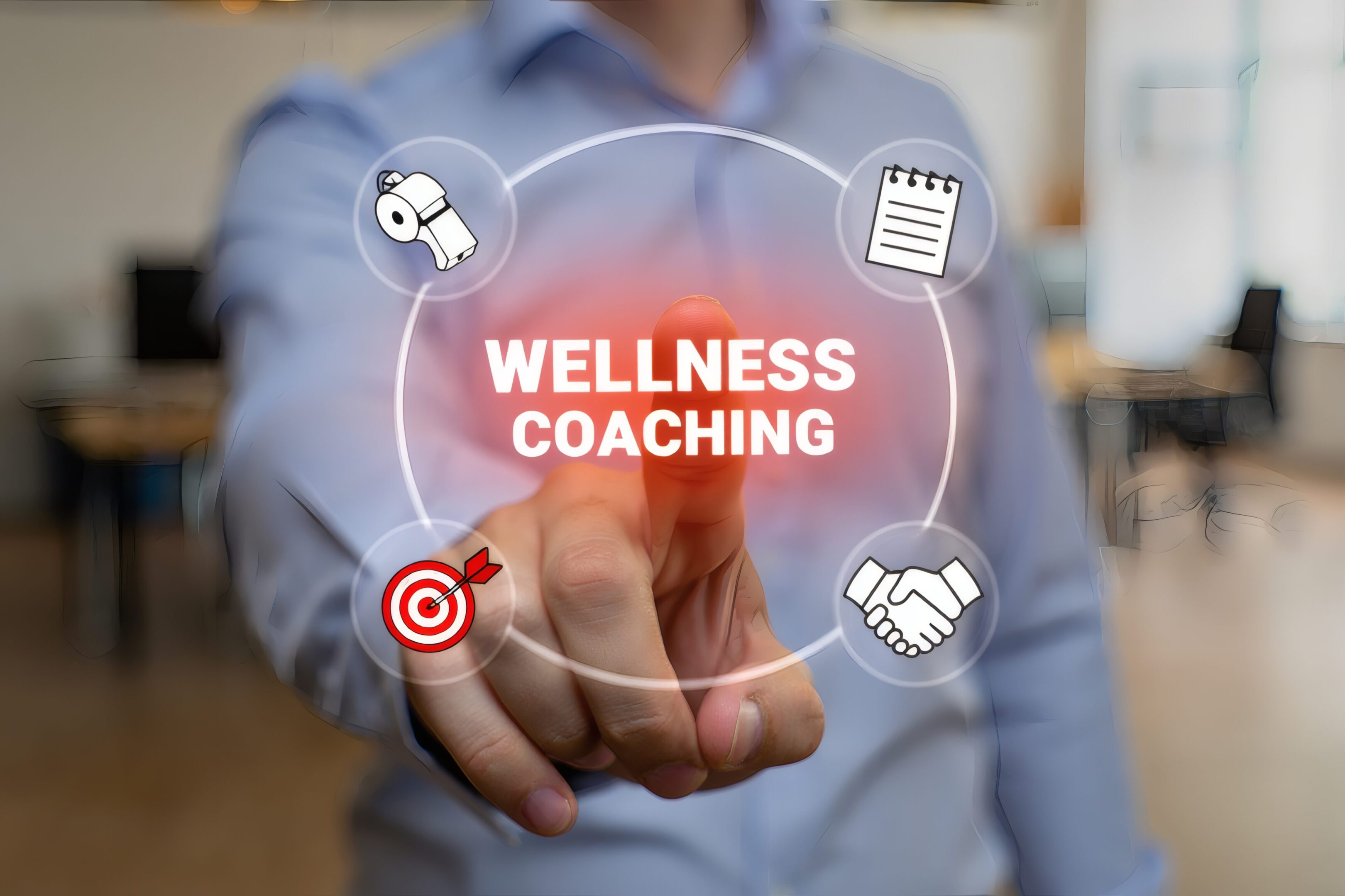 Wellness Coaching Concept Hand Pointing at Wellness Coaching Graphic with lifestyle choices for healthy living, target goals and balanced life